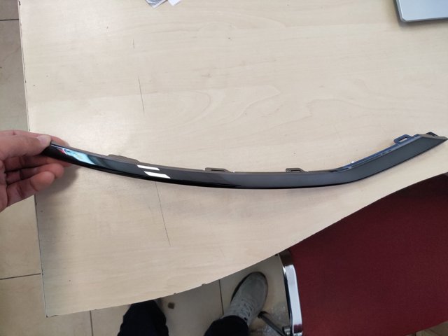 86691N7010 Hyundai/Kia Moldura de parachoques trasero izquierdo