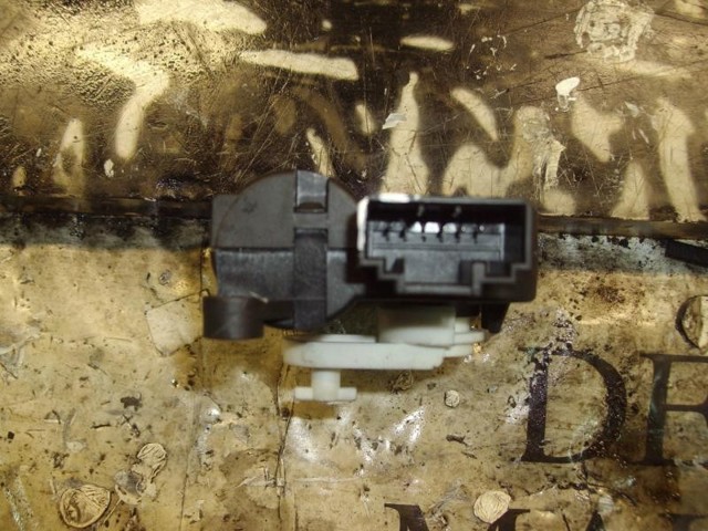 Motor regulador de faros 0132801338 VAG