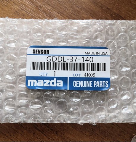 Sensor de presión de neumáticos GDDL37140 Mazda