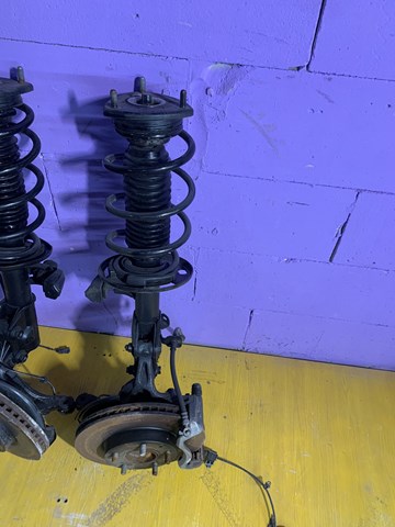 DD1V34700B Mazda amortiguador frontal derecho