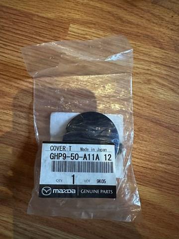 Tapa del enganche de remolcado delantera GHP950A11A12 Mazda