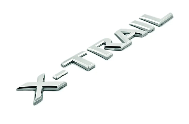 Emblema de tapa de maletero Nissan X-Trail (T30)