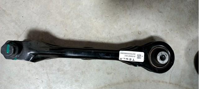 104442700C Tesla Brazo longitudinal superior trasero izquierdo/derecho