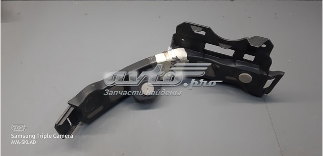 Soporte de parachoques trasero izquierdo 13125043 General Motors