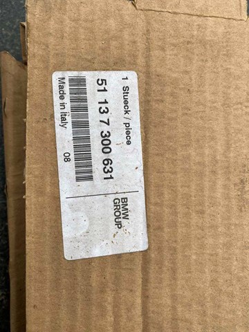 7300631 BMW Moldura del faro izquierdo