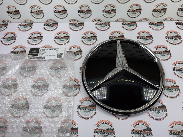 Emblema de la parrilla del radiador A000880030064 Mercedes