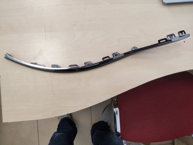 86691N7010 Hyundai/Kia Moldura de parachoques trasero izquierdo