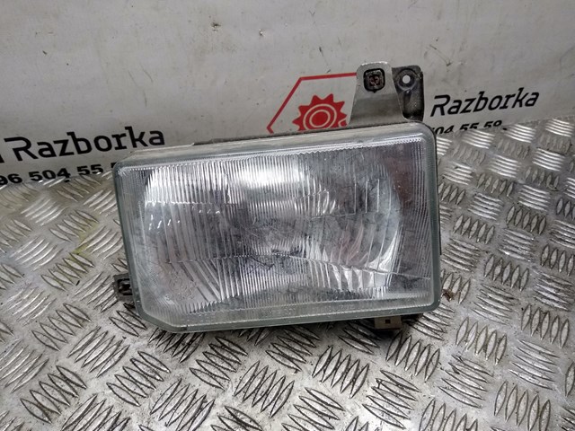 B606030G00 Nissan faro izquierdo