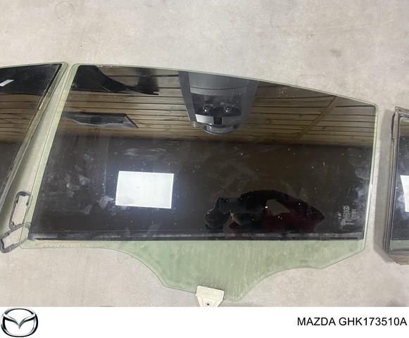 GHK173510A Mazda luna de puerta trasera izquierda