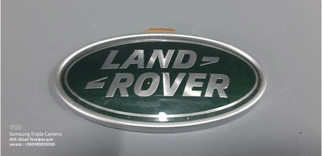 LR060140 Land Rover Logotipo de tapa de maletero