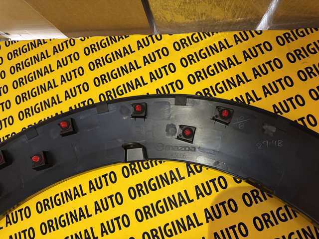 Extensión de la aleta delantera derecha DFR551W20C Mazda