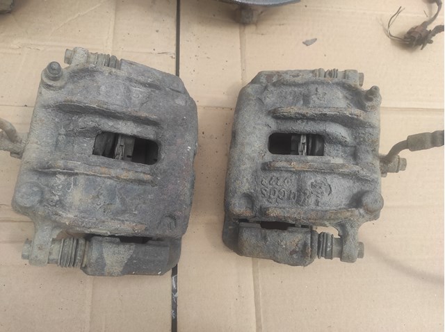 Pinza de freno delantera izquierda NISSAN 410117F000