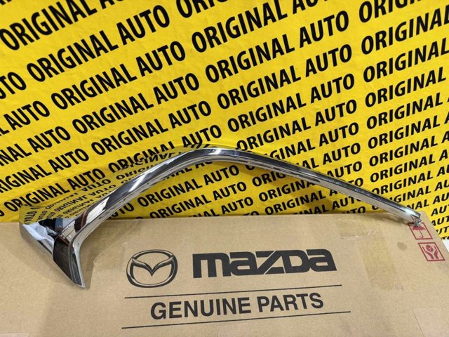 Comprar D10J507K0C Mazda Moldura de parachoques delantera izquierda