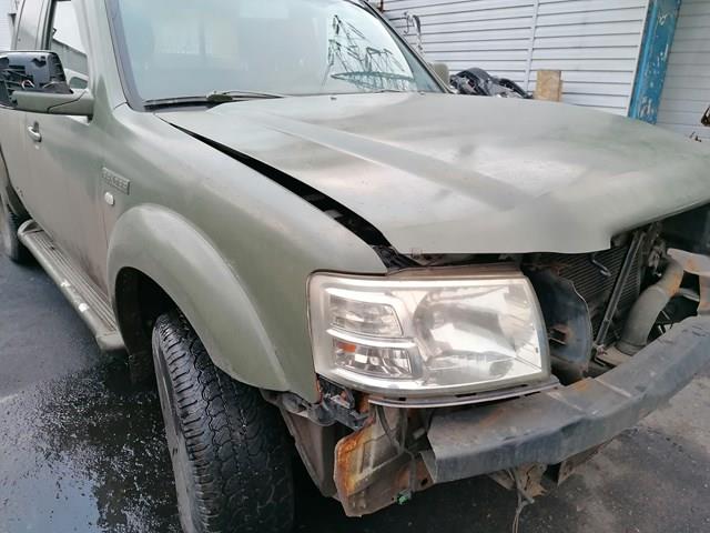 1454394 Ford faro derecho