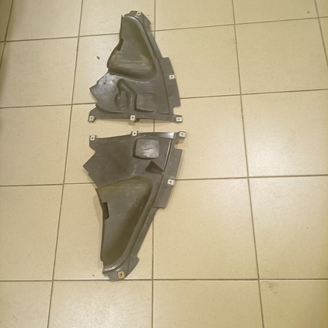 7260739 BMW Protector contra salpicaduras del paso de rueda delantero