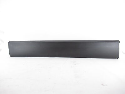 Moldura de la puerta delantera izquierda TK4851RB0B Mazda