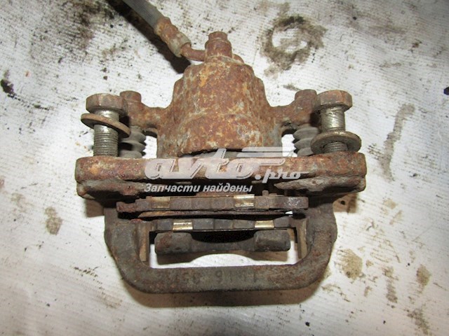 440018J10A Nissan pinza de freno trasero derecho