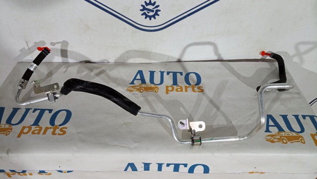 51879969 Fiat/Alfa/Lancia Manguera de baja presión de la dirección asistida, del radiador al depósito
