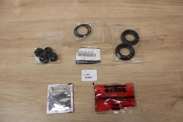 Comprar GMY02646ZA Mazda Juego de reparación, pinza de freno trasero