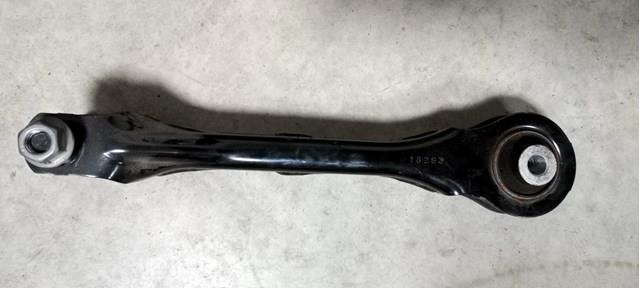 104442700C Tesla Brazo longitudinal superior trasero izquierdo/derecho