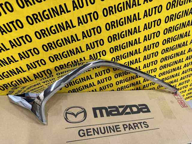 D10J507K0C Mazda Embellecedor izquierdo del parachoques delantero