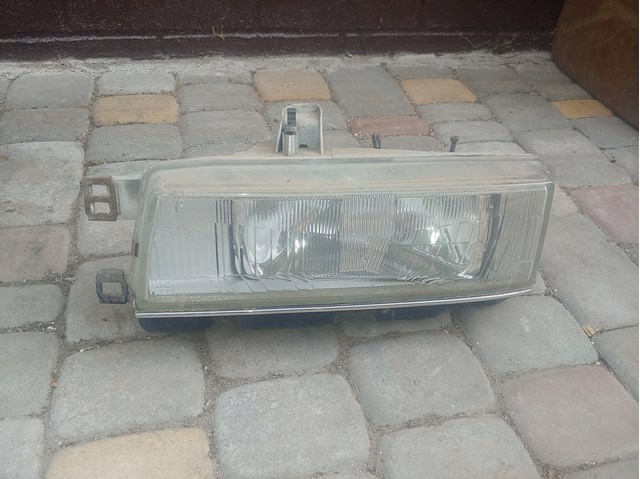 811701A720 Toyota faro izquierdo